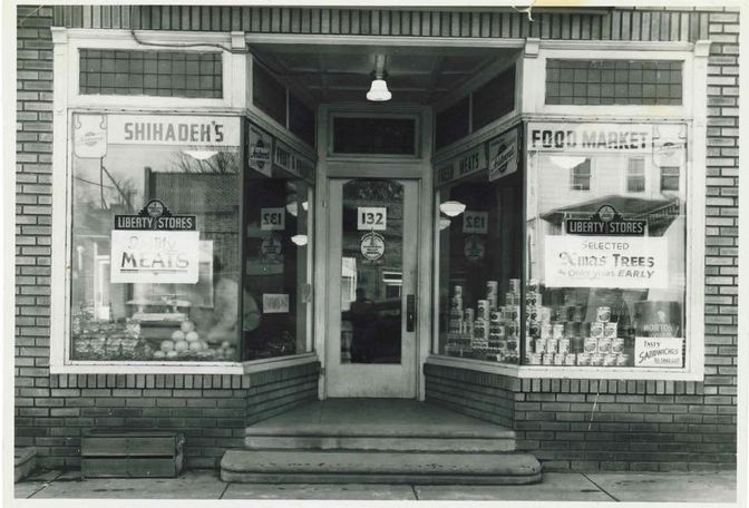 Shihadeh's Food Market, a corner grocery with Liberty Stores signage, around 1950